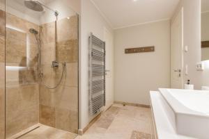 Ein Badezimmer in der Unterkunft Süster Hüs