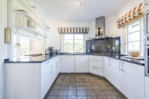 Kuchyň nebo kuchyňský kout v ubytování Landhaus Tinnumburg