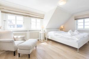 Postel nebo postele na pokoji v ubytování Landhaus Tinnumburg