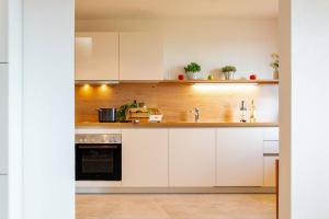 Dapur atau dapur kecil di Appartement Bergsonne