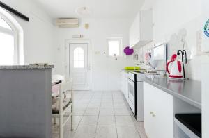 Kuchyň nebo kuchyňský kout v ubytování Apartments Ines