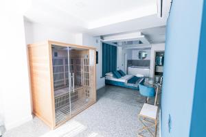 TV a/nebo společenská místnost v ubytování Hotel Ibisco Suites & Relax