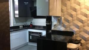 Kuchyň nebo kuchyňský kout v ubytování Misuitehotel La Carolina Quito