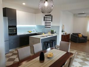 Η κουζίνα ή μικρή κουζίνα στο Apartments Jelka