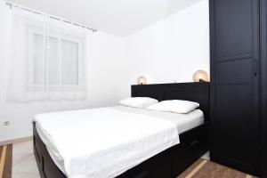 Posteľ alebo postele v izbe v ubytovaní Apartment Jaspis