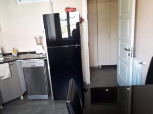 Kuchyň nebo kuchyňský kout v ubytování Guest House Kldiashvili