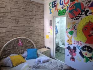 Postel nebo postele na pokoji v ubytování Guest House Kldiashvili