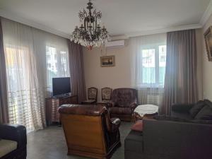 TV a/nebo společenská místnost v ubytování Guest House Kldiashvili