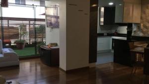 Kuchyň nebo kuchyňský kout v ubytování Misuitehotel La Carolina Quito