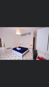 Posteľ alebo postele v izbe v ubytovaní Casa Adele b&b