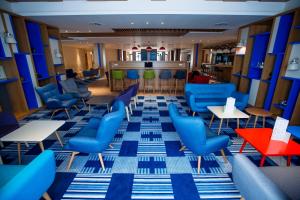 Uma área de estar em Holiday Inn - Aktau - Seaside by IHG