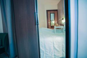HOTEL ALKQUIMIA客房内的一张或多张床位