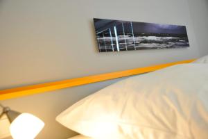 Postel nebo postele na pokoji v ubytování Haus Schuetzenstrasse Whg 1