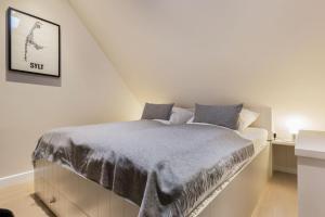 Llit o llits en una habitació de Witthues Dansk Hygge Whg 10