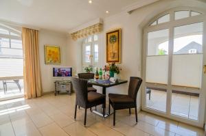 Televisyen dan/atau pusat hiburan di Residenz Bismarck Whg 12a