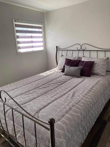 Postel nebo postele na pokoji v ubytování Maison Carofanne