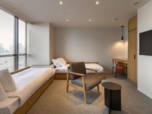TV a/nebo společenská místnost v ubytování Granbell Hotel Osaka