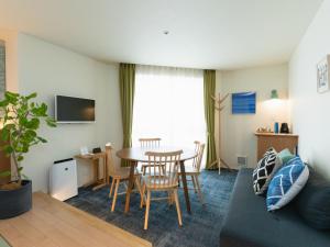 TV a/nebo společenská místnost v ubytování Nagi Kurashiki Hotel&Lounge