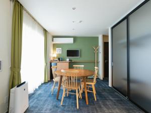 TV a/nebo společenská místnost v ubytování Nagi Kurashiki Hotel&Lounge
