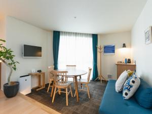 TV a/nebo společenská místnost v ubytování Nagi Kurashiki Hotel&Lounge