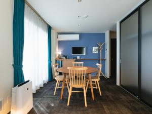 TV a/nebo společenská místnost v ubytování Nagi Kurashiki Hotel&Lounge