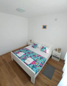 Postel nebo postele na pokoji v ubytování Apartmani Valuna