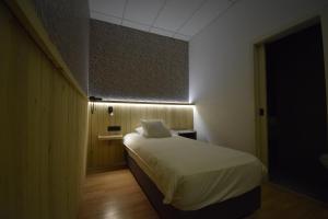 Llit o llits en una habitació de Hotel Gasthof 't Zweerd