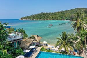 a view of a beach with boats in the water at Cookies Salad Resort in Salad Beach