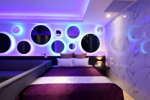 Postel nebo postele na pokoji v ubytování I-Like Motel + 37 fotografií