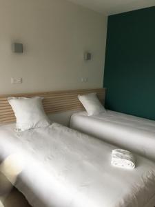 Postel nebo postele na pokoji v ubytování La Résidence du Parc d'Olhain
