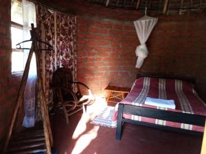 Ліжко або ліжка в номері Mailua Retreat