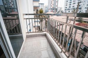 a balcony with a view of a city at Jatra Flagship Chattogram City Centre in Chittagong