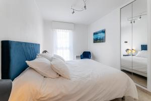 Кровать или кровати в номере Lou Bèu par Dodo-a-Cassis
