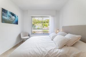 Кровать или кровати в номере Lou Bèu par Dodo-a-Cassis