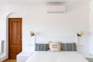 Postel nebo postele na pokoji v ubytování Casa Amigos Mallorca + 21 fotografií