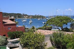 a view of a harbor with boats in the water at L'Arche de Porquerolles in Porquerolles