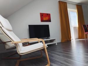 Telewizja i/lub zestaw kina domowego w obiekcie Apartment St. Pölten