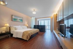 Imagen de la galería de Qingdao Housing International Hotel, en Qingdao