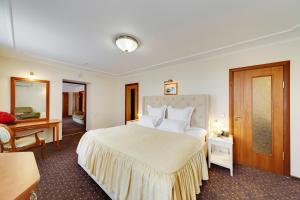 
Кровать или кровати в номере Отель Полюстрово
