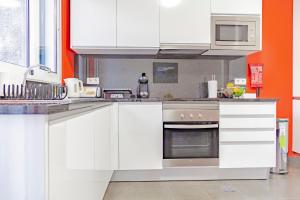 A cozinha ou kitchenette de Harmony Apartment