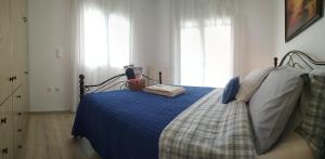 A bed or beds in a room at Emily`s vacation house