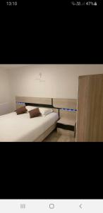 Кровать или кровати в номере La Cooconing