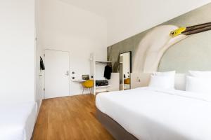Postel nebo postele na pokoji v ubytování B&B HOTEL Basel + 28 fotografií
