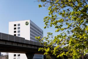 a building with the bmw logo on it at B&B HOTEL Basel in Basel