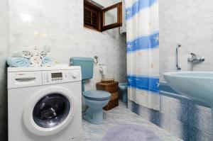 Kúpeľňa v ubytovaní Apartment Giovani + 7 fotografií