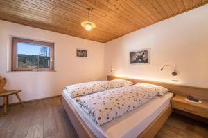 Posteľ alebo postele v izbe v ubytovaní Ferienwohnung Mittager Edelweiss