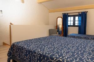 Postel nebo postele na pokoji v ubytování Duplex vue Piscine B