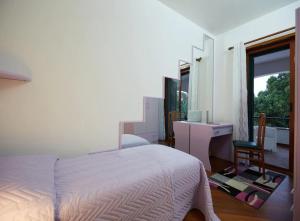 A bed or beds in a room at Villa Morenanoemi - private pool