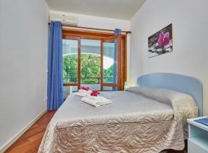 A bed or beds in a room at Villa Morenanoemi - private pool
