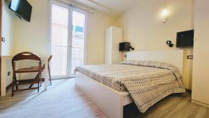 Postel nebo postele na pokoji v ubytování Residence Rosa